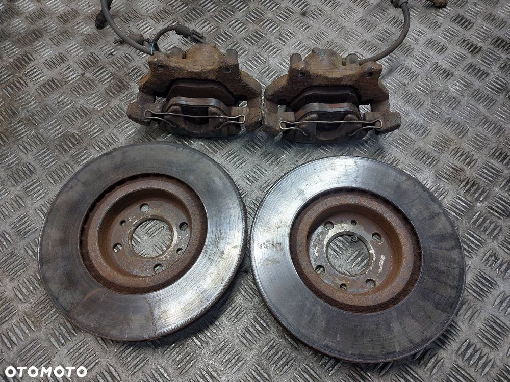 TARCZE HAMULCOWE PRZÓD + KLOCKI + ZACISKI LANCIA LYBRA I 1.9 JTD - 2