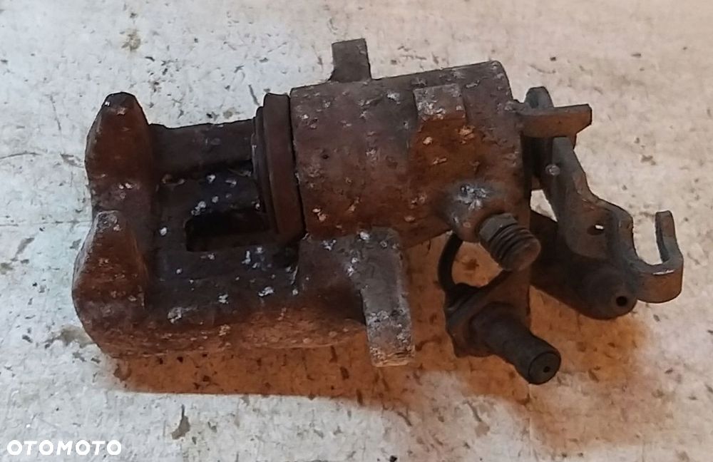 GOLF V 5 OCTAVIA II ZACISK TYŁ TYLNY TYLNI PRAWY - 2