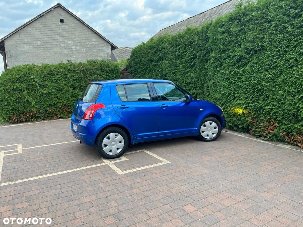 Suzuki Swift 1.3 Club - 8
