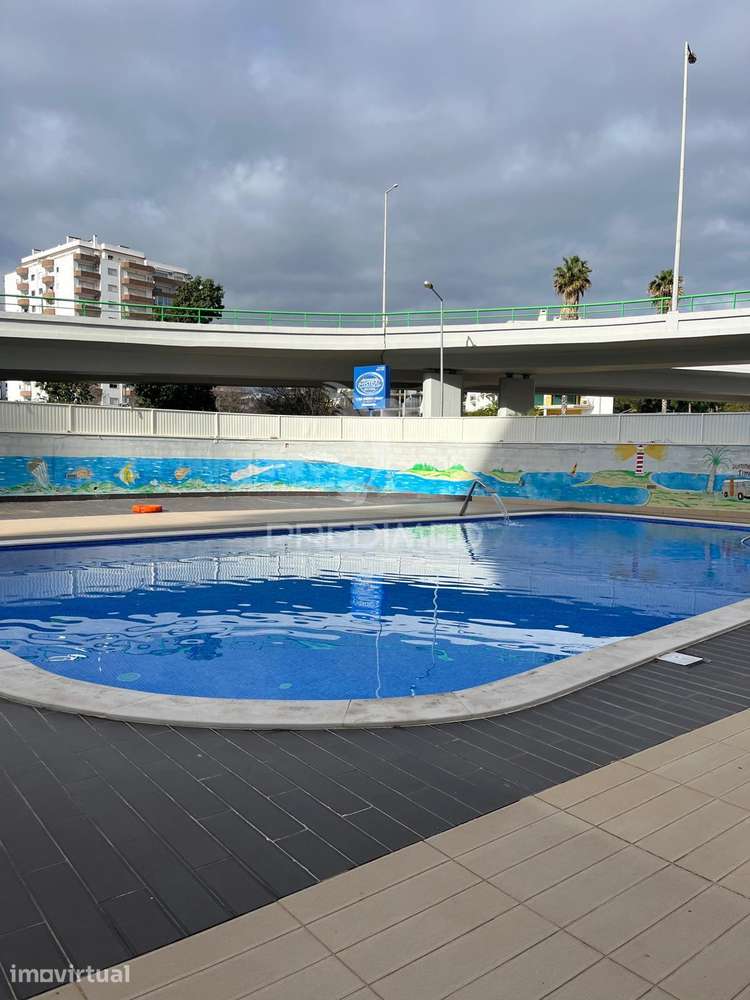 Apartamento com piscina e lugar de garagem na praia da rocha - Grande imagem: 2/8