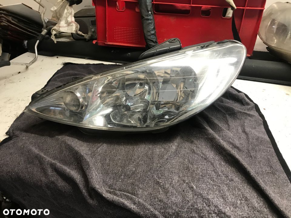 Reflektor peugeot lewy 206  89000521 - 1