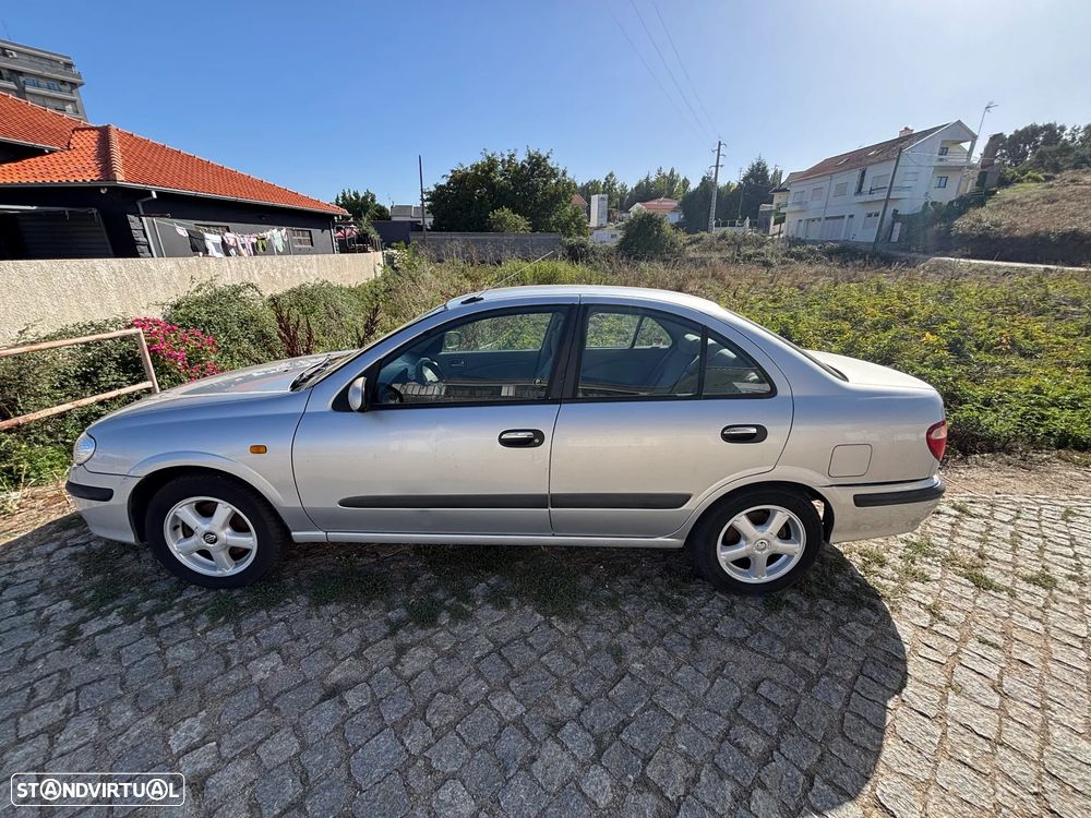 Nissan Almera 1.5 Comfort ABS+AC - 1
