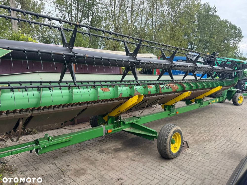John Deere T670 - 21