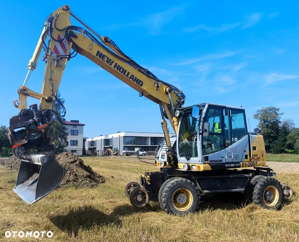 New Holland MH PLUS Koparka drogowo-szynowa