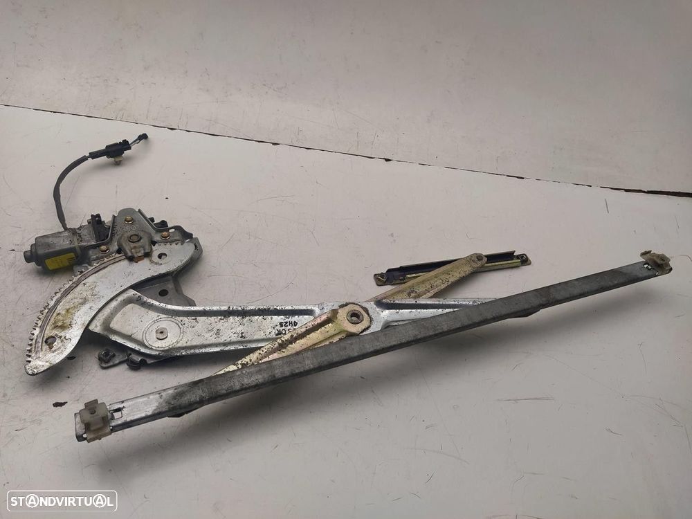 ELEVADOR DE VIDRO FRONTAL ESQUERDO KIA CARNIVAL II 2004 - 4