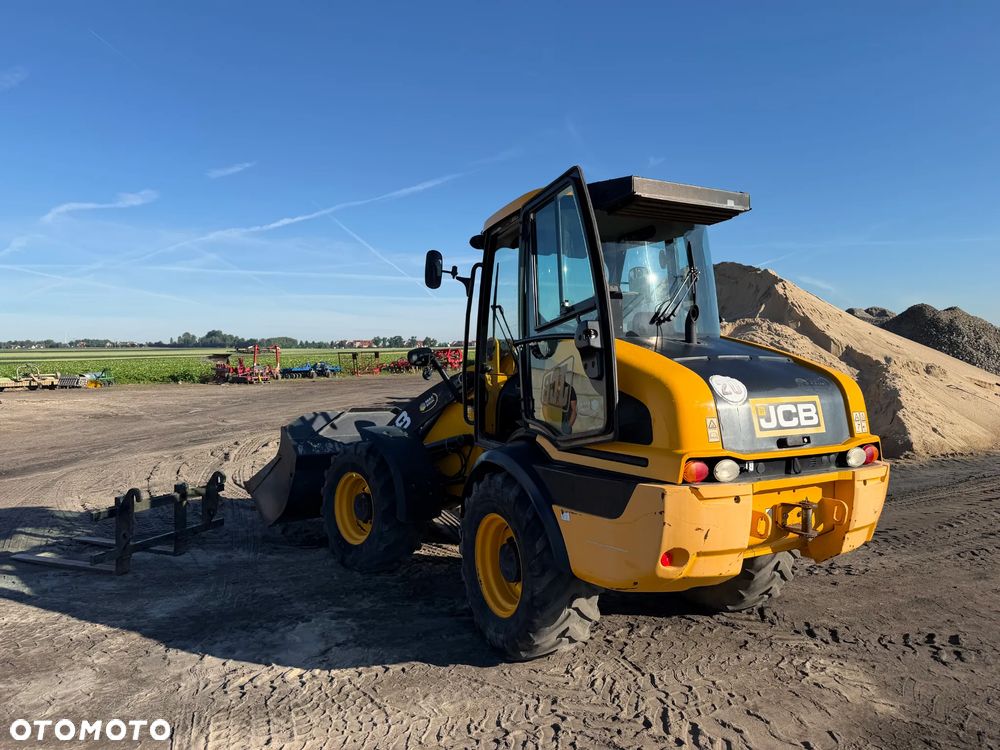 JCB 409 - 6