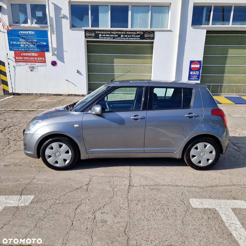 Suzuki Swift 1.3 Club - 4