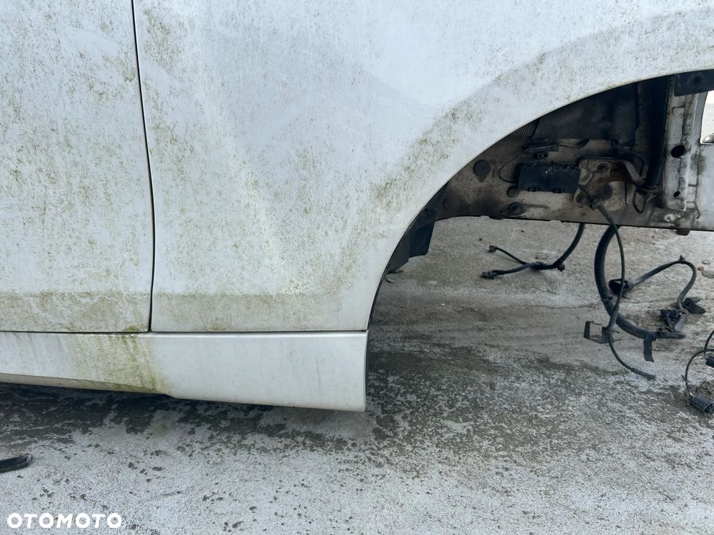 BŁOTNIK PRAWY PRZÓD BMW E87 - 2
