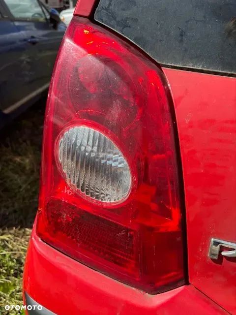 LAMPA TYŁ LEWA PRAWA NISSAN PIXO - 2