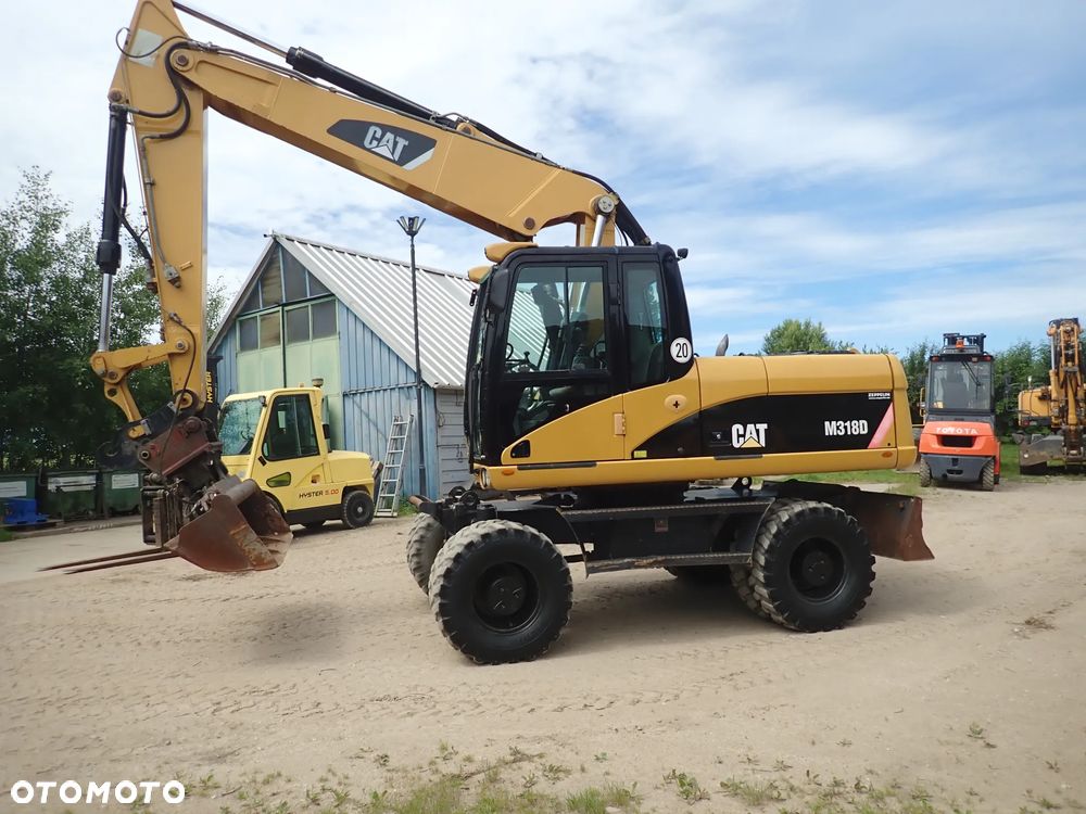 Caterpillar M318D - 6