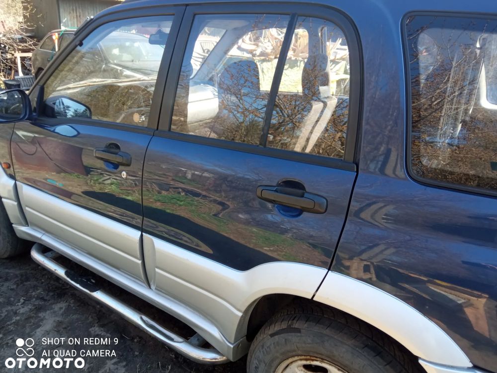 Suzuki Grand Vitara 2.0 - 10
