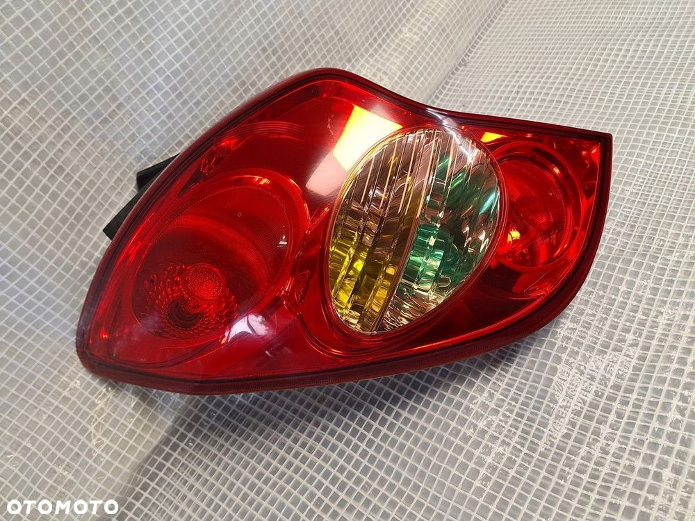 ssangyong korando III  2010- lampa tyl tylna lewa europa orgina . demont - 3