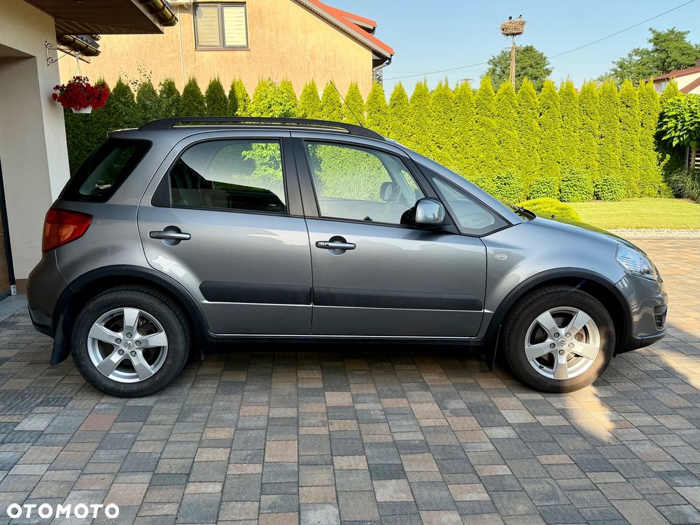 Suzuki SX4 1.6 Comfort Plus - 7