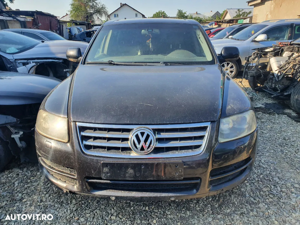 Dezmembrez Vw Touareg an 2006 motor 3.0 tdi V6 224 cp cod BKS Volan Stanga chit injectie injector injectoare pompa inalta turbo turbina cardan grup diferential fata spate compresor clima ac kit conversie plansa bord cutie transfer etrier dezmembrari piese