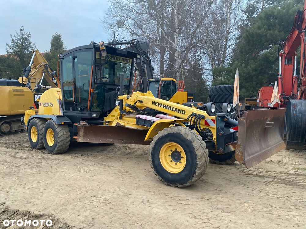 New Holland F106.7A, 7800 MTH, SYSTEM NIWELACJI TRIMBLE 3D, Z NIEMIEC, NAPĘD 6X6, ZRYWAK, PRZEDNI PŁUG, - 1