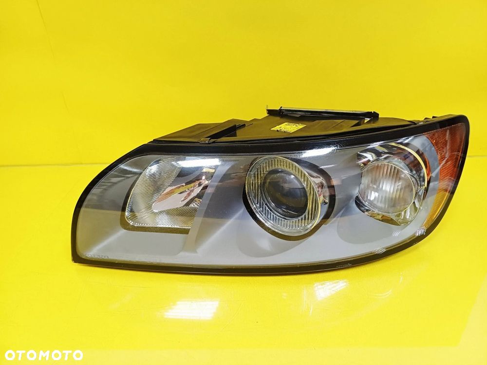 REFLEKTOR LAMPA LEWY PRZÓD SOCZEWKA VOLVO V50 I 31335221 NR103 - 1