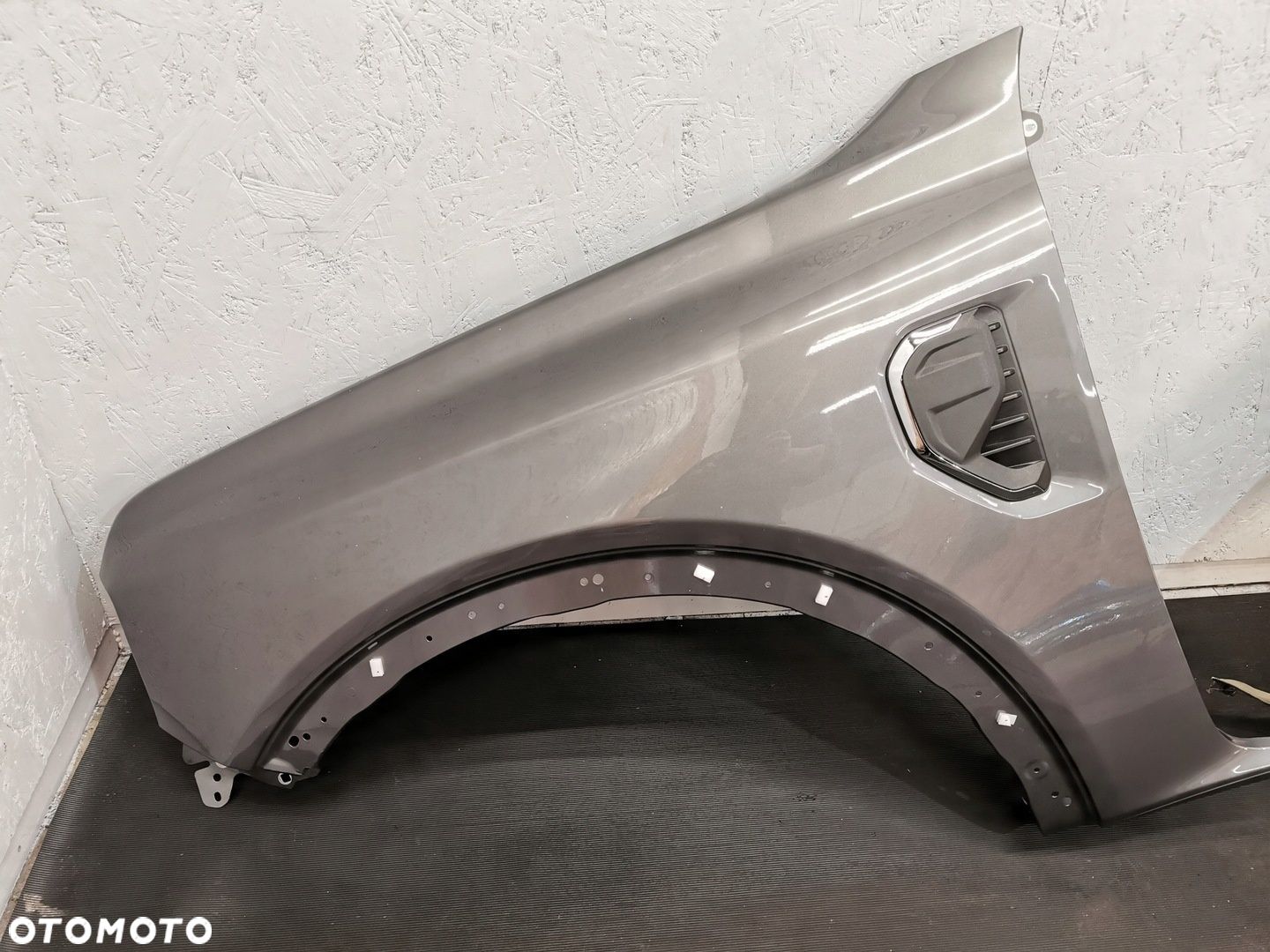 FORD RANGER 6 VI 22- BŁOTNIK PRZEDNI LEWY ORYGINALNY Carbonized Gray - 1