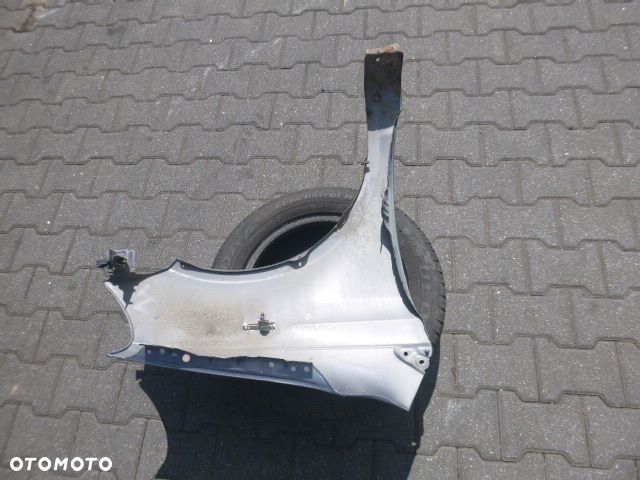 BŁOTNIK LEWY PRZÓD LEWY PRZEDNI TOYOTA YARIS I LIFT KOLOR 855 - 14
