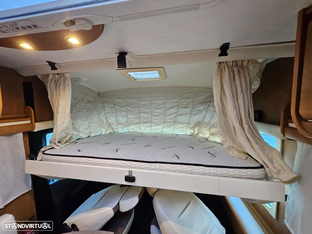 Rapido Le Randonneur 9097F CHASSI AL-KO Cama transversal + BASCULANTE - 50