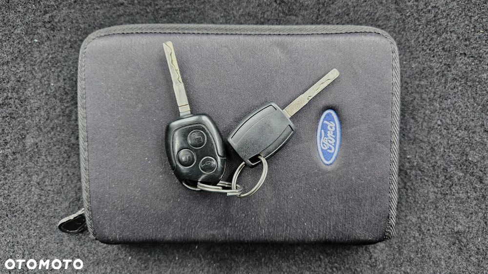 Ford Focus 1.4 16V Style+ - 13