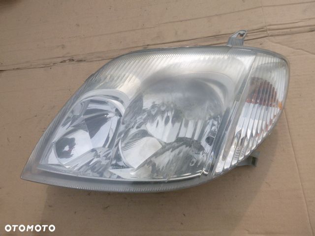LAMPA LEWY PRZÓD LEWA PRZEDNIA TOYOTA COROLLA E12 01- - 12