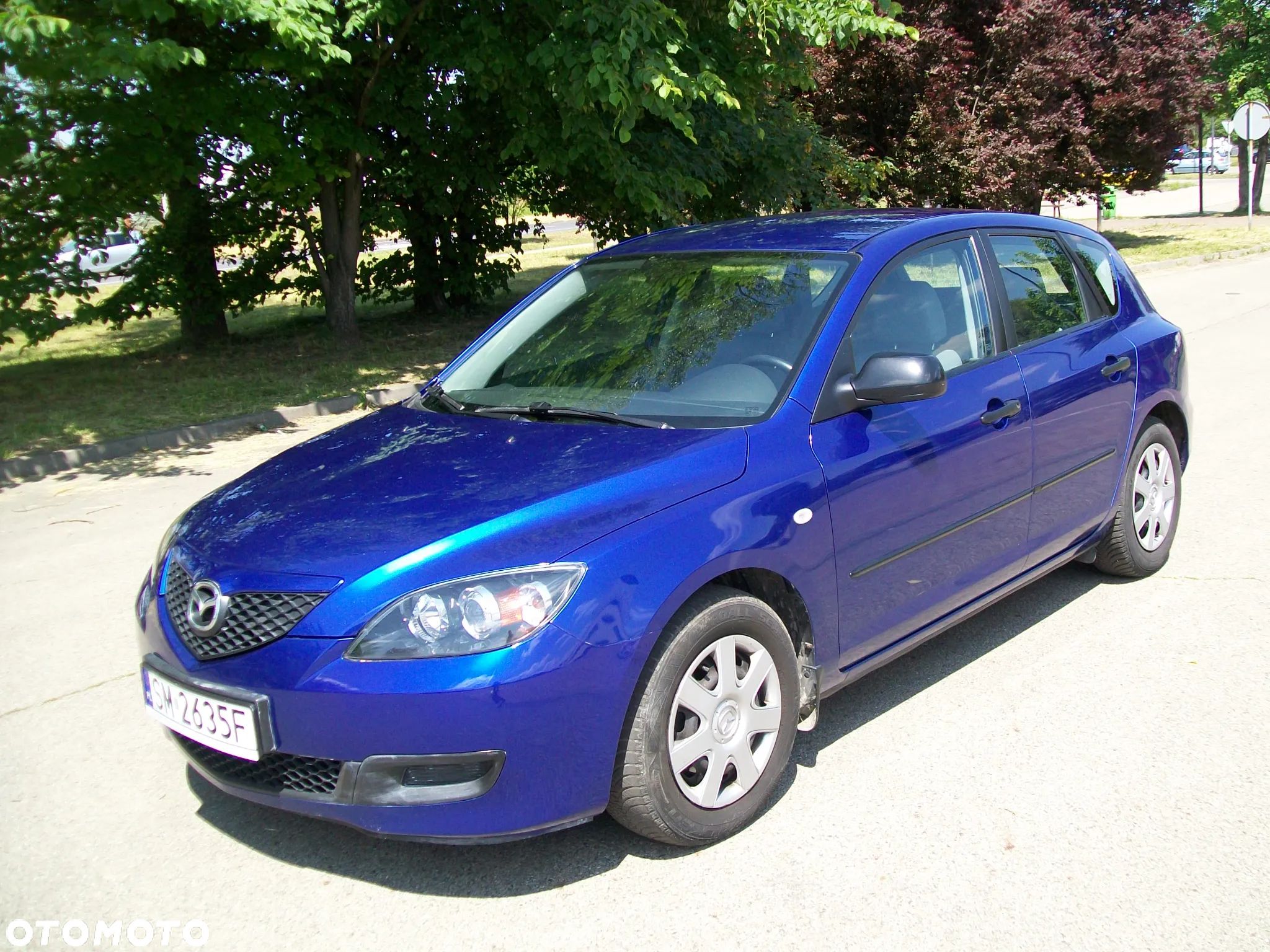 Mazda 3 1.4 Comfort - 1