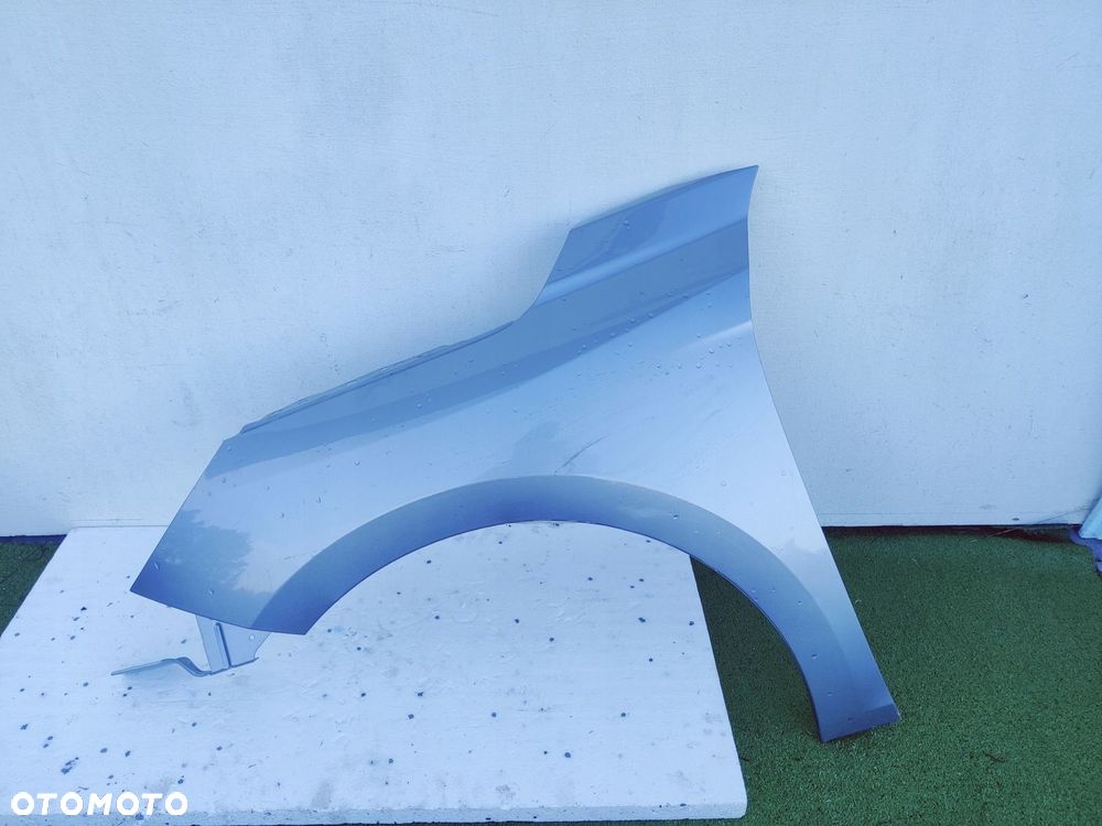 Błotnik lewy Opel Corsa F - 1