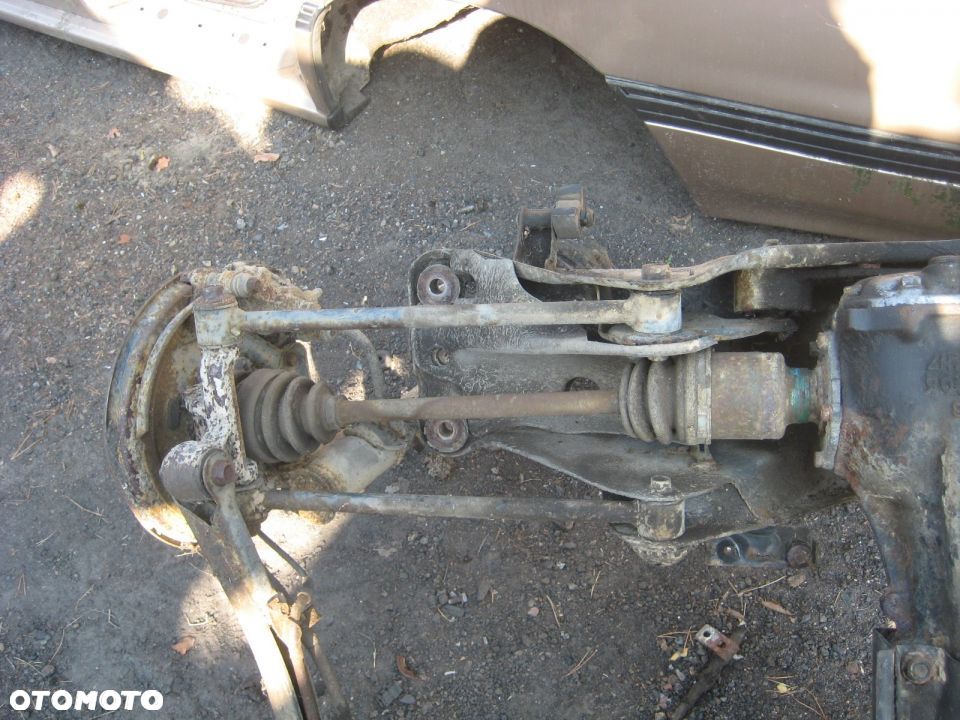 SUBARU LEGACY SEDAN 89-94R WAHACZ TYŁ LEWY - 1