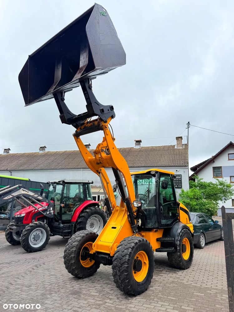 JCB 409 - 12