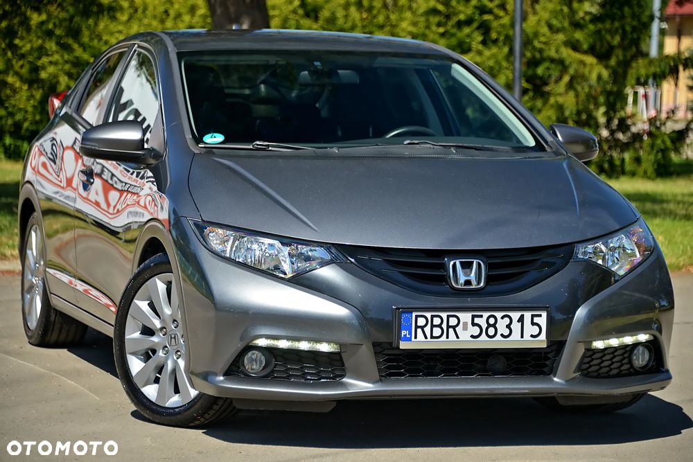 Honda Civic 1.4 i-VTEC - 9