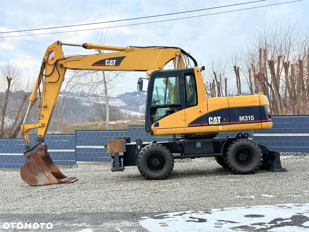 Caterpillar CAT M315C  CATERPILLAR SPROWADZONY  Bardzo Dobry Stan - 9