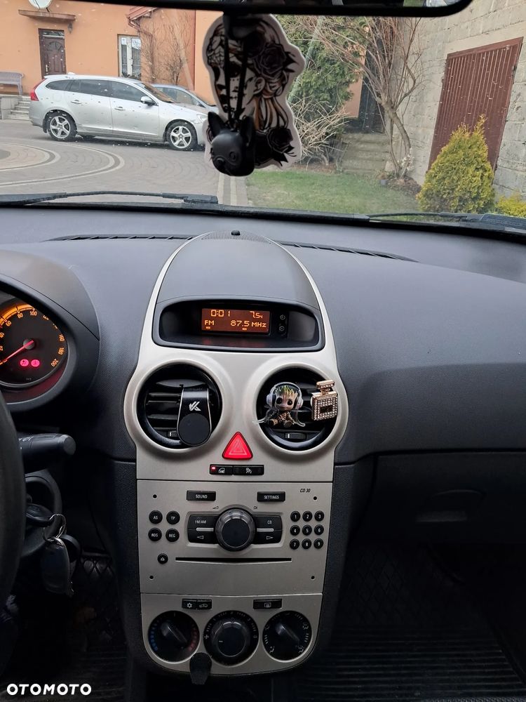 Opel Corsa 1.2 16V Cosmo - 11