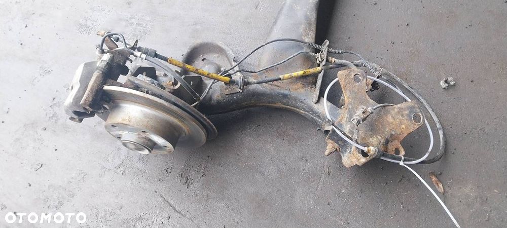 BELKA OŚ ZAWIESZENIA TYŁ TARCZE Z ABS RENAULT MEGANE III KOMBI 1.6 16V - 4