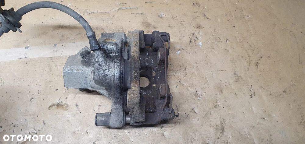 Zacisk hamulcowy lewy tył tylny Ford Focus Mk3 - 7