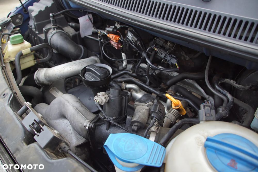 Auto na części - Volkswagen Transporter T5 2.5 TDI 130 KM BNZ KPE LL5M 2008R Silnik Skrzynia Drzwi Maska Klapa Błotnik Zderzak Lampa Szyba Klamka Lusterko Deska Kokpit Sterownik Moduł Czujnik Licznik Wyświetlacz Panel Kierownica - 17