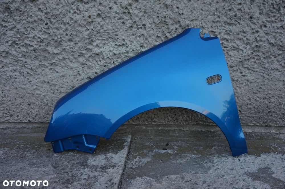 BŁOTNIK PRZÓD LEWY VW POLO 9N OKULAR LA5M 01/05r - 1