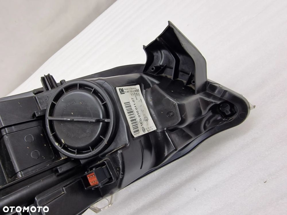 OPEL ASTRA J IV 08-12 LEWA ZWYKŁA CZARNA LAMPA PRZEDNIA PRZÓD , NR 13297722 , NR AUKCJI LL388 - 16