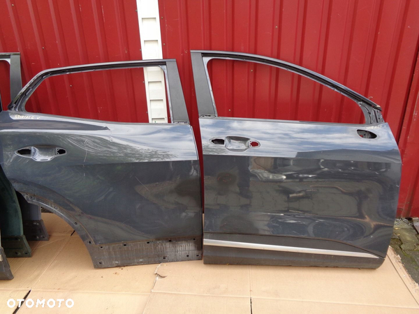 Kia Sportage V drzwi prawe przednie