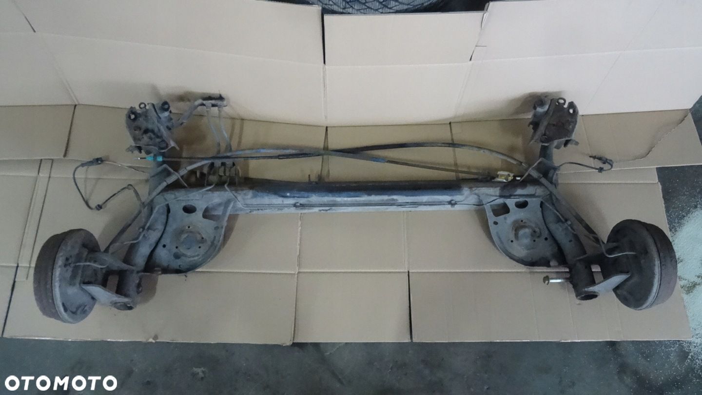 CLIO 3 III BELKA OŚ TYLNIA ZAWIESZENIA - 1