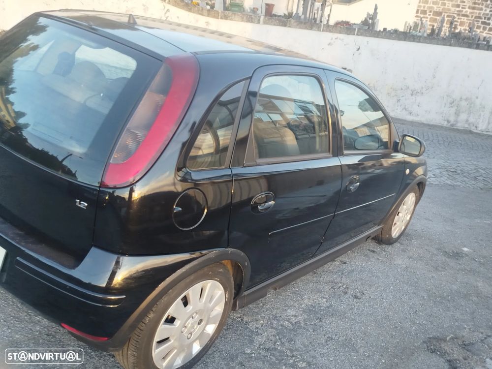 Opel Corsa 1.2 16V Cosmo - 8