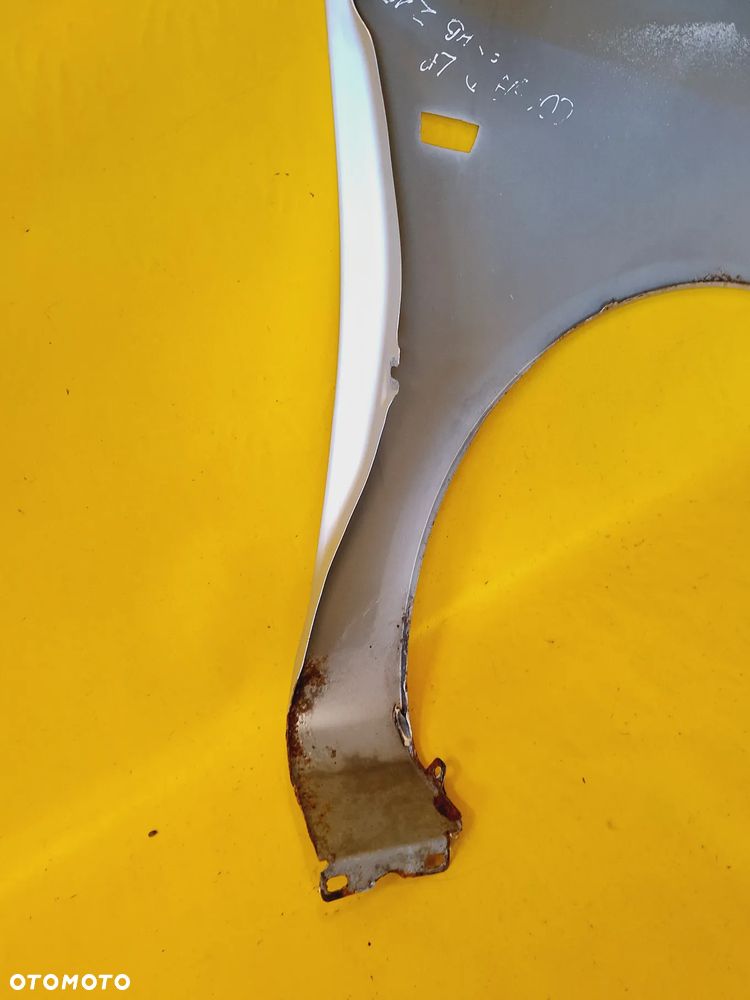 BŁOTNIK LEWY PRZÓD PRZEDNI OPEL CORSA D 3D HB 06-11 LAK: Z157 NR652 - 10