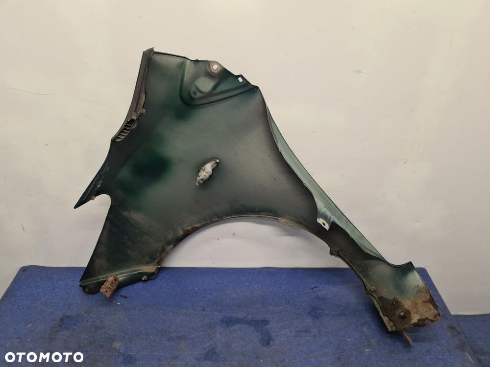 TOYOTA YARIS II LIFT BŁOTNIK PRZÓD PRAWY 6S3 - 8
