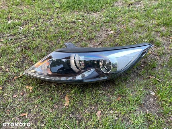 Lampa przednia lewa / reflektor KIA SPORTAGE III