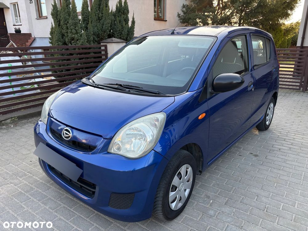 Daihatsu Cuore 1.0 Top - 1
