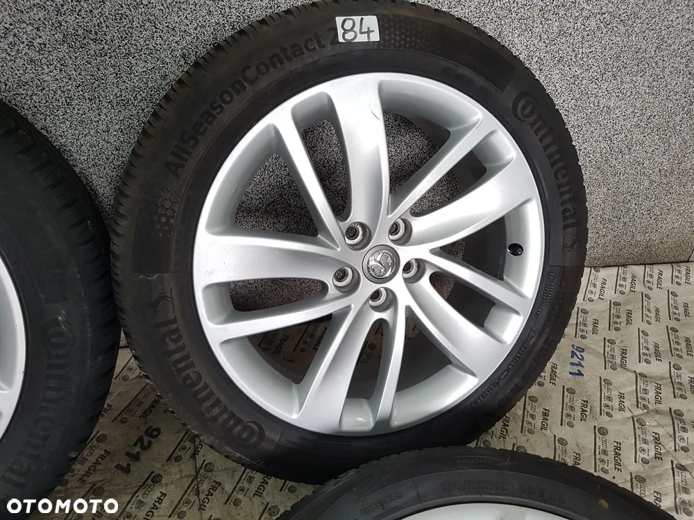 KOŁA CAŁOROCZNE OPEL MOKKA TRAX  5X105  7JX18  215/55R18  215/55/18 - 13