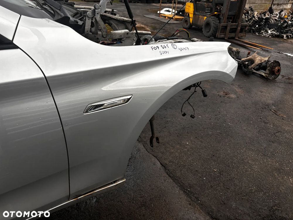 BŁOTNIK PRZEDNI PRAWY BMW 5GT F07 354/7 - 2