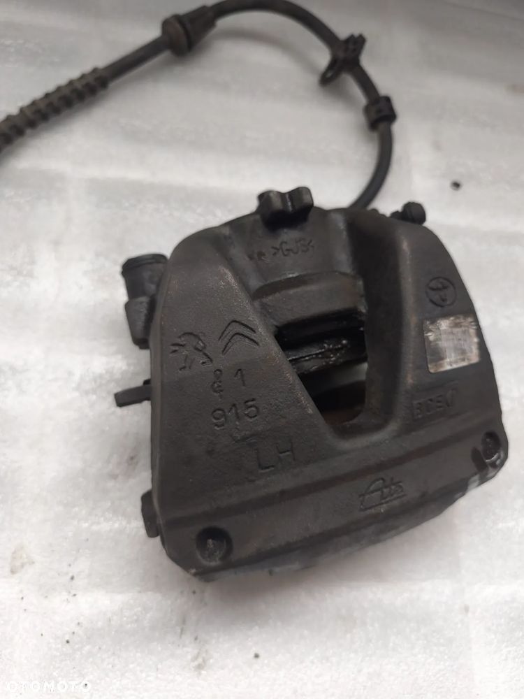 Zacisk lewy przód citroen Jumpy Peugeot Expert Toyota Proace Vivaro PSA 9805256280 2016-2024 - 2