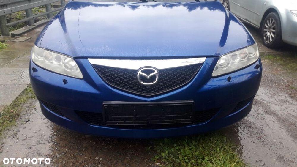 Mazda 6 02-07 Maska lampa zderzak pas atrapa 25B - 1