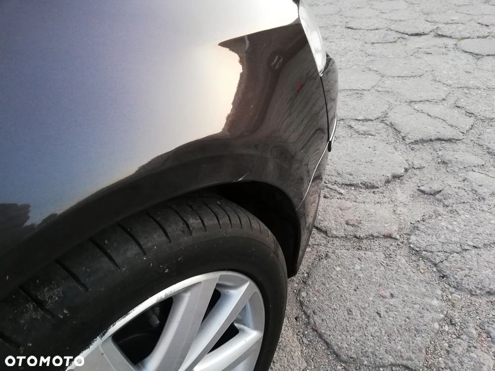 Volkswagen Passat 2.0 TDI Highline - 11