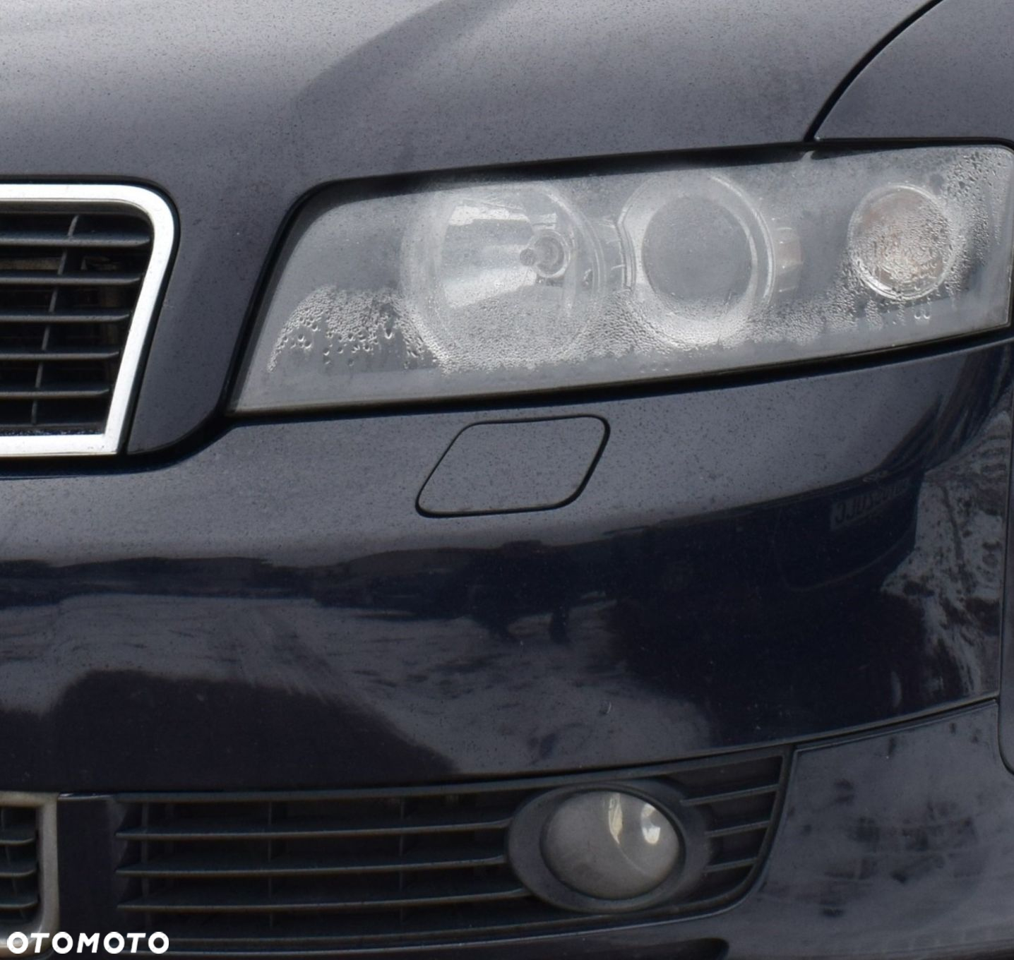 Zaślepka spryskiwacza lampy AUDI A4 B6 KOLOR L / P - 10